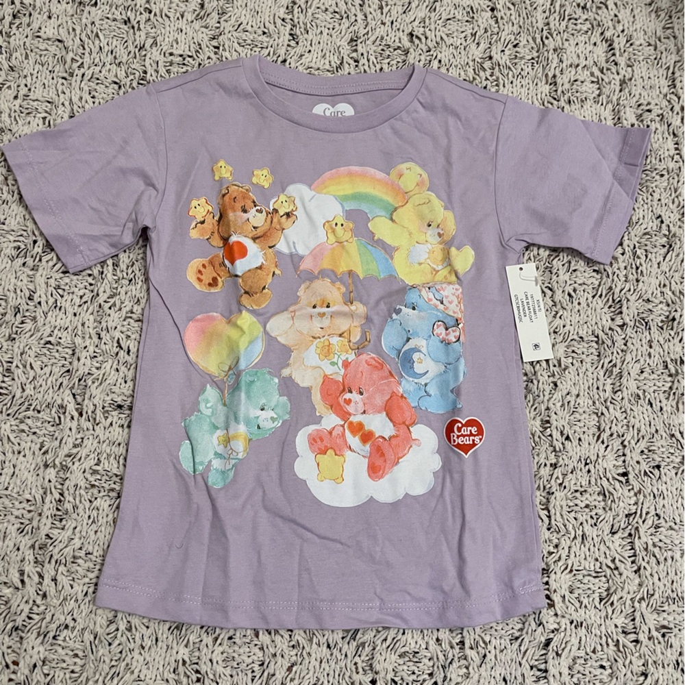 Care Bears Lavender Purple Short Sleeve Tee with Multicolor Bear Graphics
